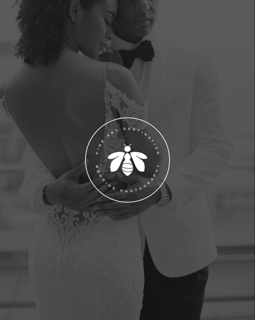 Logo submark featuring a bee icon in the middle of a circle, overlayed on an image of an elegant Black bride and groom